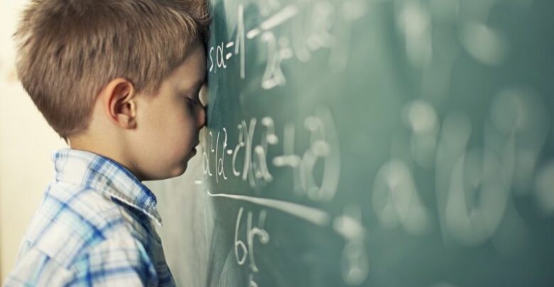 Boy struggling to learn math
